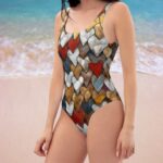 Viendaļīgs peldkostīms “Janita” ar krāsainu sirsniņu apdruku Tev nodrošinās komfortu gan aktīvi kustoties, gan laiski gozējoties saulē. Tam ir vienkāršs un klasisks piegriezums bez liekām detaļām, peldkostīma forma piekļausies Tavam ķermenim un veidos vizuāli pievilcīgu siluetu. Spēlē volejbolu pludmalē, peldies, skrien, sauļojies un esi skaista! Peldkostīms “Janita” ir šūts no patīkama materiāla, bet pievienotais spandekss nodrošina elastību. Audums neizbalēs saulē un peldkostīms nezaudēs formu pēc mazgāšanām. Audums un apdruka nebojājas hlora ietekmē.